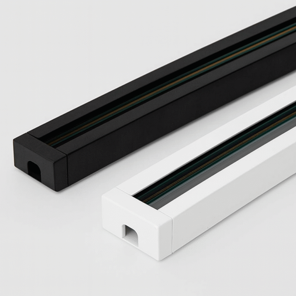 Black and white track sticks for lighting systems from DNK Store, featuring sleek aluminum design with recessed conductive rails on a clean background.